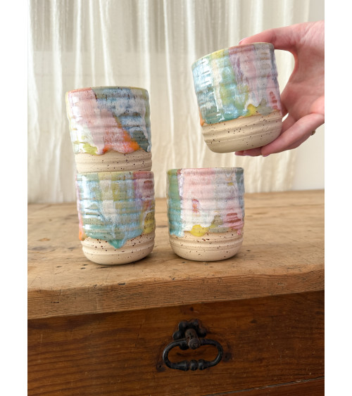 Handmade artisanal ceramic rainbow cup