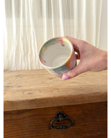 Handmade artisanal ceramic rainbow cup