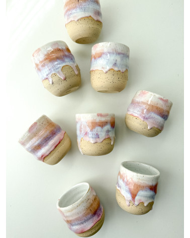 Handmade artisanal ceramic rainbow beach cup