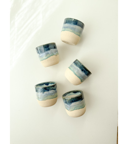 Handmade artisanal ceramic rainbow beach cup