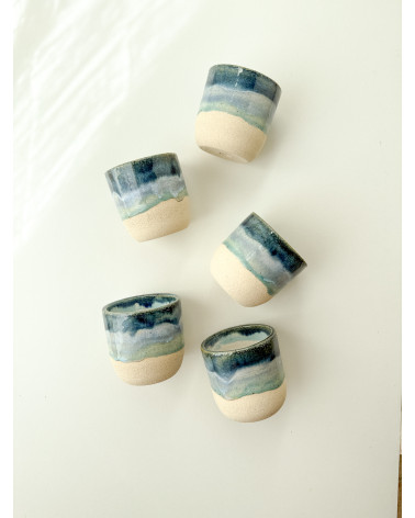 Handmade artisanal ceramic rainbow beach cup