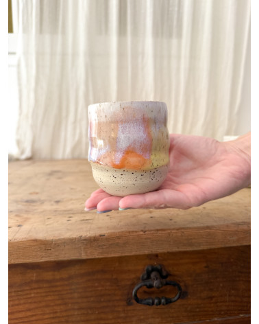 Handmade artisanal ceramic rainbow cup