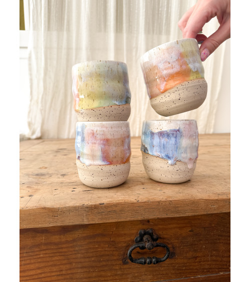 Handmade artisanal ceramic rainbow cup