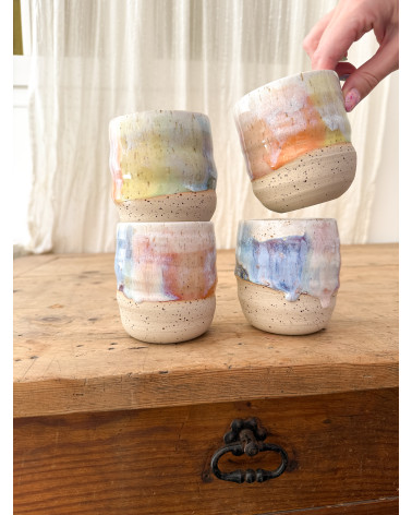 Handmade artisanal ceramic rainbow cup