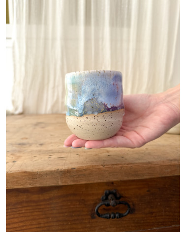 Handmade artisanal ceramic rainbow cup