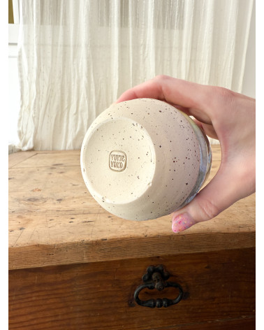 Handmade artisanal ceramic rainbow cup