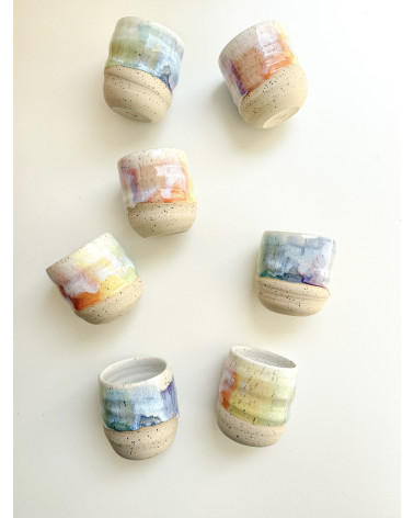 Handmade artisanal ceramic rainbow cup